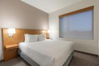 Ein Bett oder Betten in einem Zimmer der Unterkunft Hyatt Place Sandestin at Grand Blvd