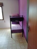 Posteľ alebo postele v izbe v ubytovaní Villa Vacanze Giuseppe