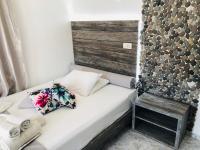 Postel nebo postele na pokoji v ubytování Villa Livadaros