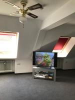 TV a/nebo společenská místnost v ubytování Hotel Guntia Boardinghouse
