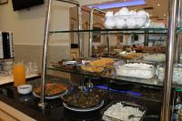 a buffet line with many different types of food at Grand Georgian Palace in Batumi
