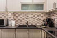 A kitchen or kitchenette at Beautiful Apartment at Plaka