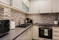 A kitchen or kitchenette at Beautiful Apartment at Plaka