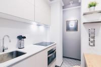 Kuchyň nebo kuchyňský kout v ubytování Gran Via Apartment by People Rentals
