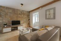 Televízia a/alebo spoločenská miestnosť v ubytovaní Vacation house "Kaštil" Pučišća - Brač
