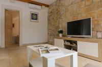 Televízia a/alebo spoločenská miestnosť v ubytovaní Vacation house "Kaštil" Pučišća - Brač