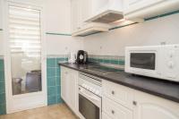 Kuchyň nebo kuchyňský kout v ubytování Denia Las Marinas Apartamento