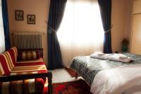 Llit o llits en una habitaci&oacute; de Militsa Guesthouse