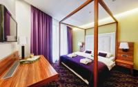 Posteľ alebo postele v izbe v ubytovaní Hotel Sport
