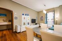 Televízia a/alebo spoločenská miestnosť v ubytovaní Apartamentos San Marcial 28