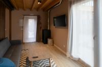 TV a/nebo společenská místnost v ubytování Apartamentos y Villas La Santilar