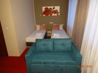 Posteľ alebo postele v izbe v ubytovaní Carina Hotel