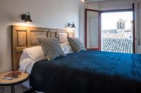 Postel nebo postele na pokoji v ubytování Hotel Alda Jolio Jaca
