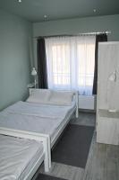 Łóżko lub łóżka w pokoju w obiekcie Motel Lunar
