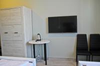 Telewizja i/lub zestaw kina domowego w obiekcie Motel Lunar