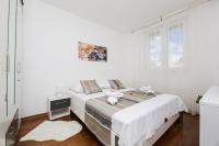 Posteľ alebo postele v izbe v ubytovaní Apartman Bubli