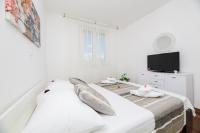 Posteľ alebo postele v izbe v ubytovaní Apartman Bubli