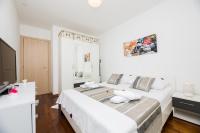 Posteľ alebo postele v izbe v ubytovaní Apartman Bubli