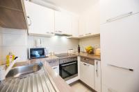 Kuchyňa alebo kuchynka v ubytovaní Apartman Bubli