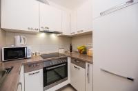 Kuchyňa alebo kuchynka v ubytovaní Apartman Bubli
