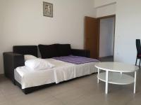Postel nebo postele na pokoji v ubytování Sun Apartments