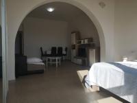 Postel nebo postele na pokoji v ubytování Sun Apartments