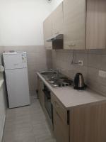 Kuchyň nebo kuchyňský kout v ubytování Sun Apartments