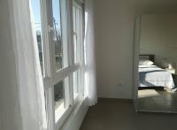 Postel nebo postele na pokoji v ubytování Sun Apartments