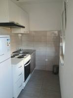 Kuchyň nebo kuchyňský kout v ubytování Sun Apartments