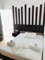 Postel nebo postele na pokoji v ubytování Villa Livadaros
