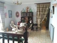 Posezení v ubytování HOSTAL RESTAURANTE MILAN II