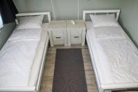 Łóżko lub łóżka w pokoju w obiekcie Motel Lunar