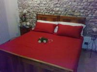 A bed or beds in a room at B&B Corte Alfier