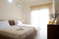 Posteľ alebo postele v izbe v ubytovaní Nema Villas