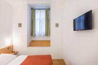 TV a/nebo společenská místnost v ubytování Duskova Apartments
