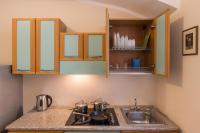 Kuchyň nebo kuchyňský kout v ubytování Duskova Apartments