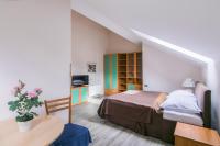 Postel nebo postele na pokoji v ubytování Duskova Apartments