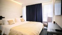Posteľ alebo postele v izbe v ubytovaní Sky Beach Aparthotel