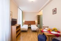 Postel nebo postele na pokoji v ubytování Duskova Apartments