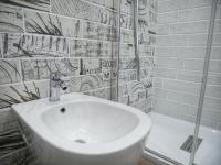 Kúpeľňa v ubytovaní Denza Apartments