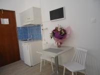 A kitchen or kitchenette at Kallithea Studios