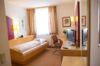 Posteľ alebo postele v izbe v ubytovaní Gastwirtschaft & Hotel Holzinger