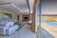 Villa de 4 dormitorios con vistas al mar y piscina privada - Incluye 1 hora de deportes acuáticos