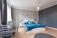 A bed or beds in a room at Cute Red Star Studio City Center