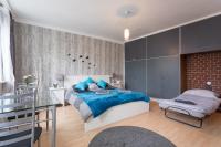 A bed or beds in a room at Cute Red Star Studio City Center