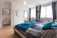 A bed or beds in a room at Cute Red Star Studio City Center