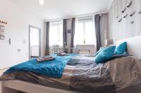 A bed or beds in a room at Cute Red Star Studio City Center