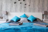 A bed or beds in a room at Cute Red Star Studio City Center