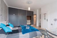 A bed or beds in a room at Cute Red Star Studio City Center