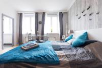 A bed or beds in a room at Cute Red Star Studio City Center